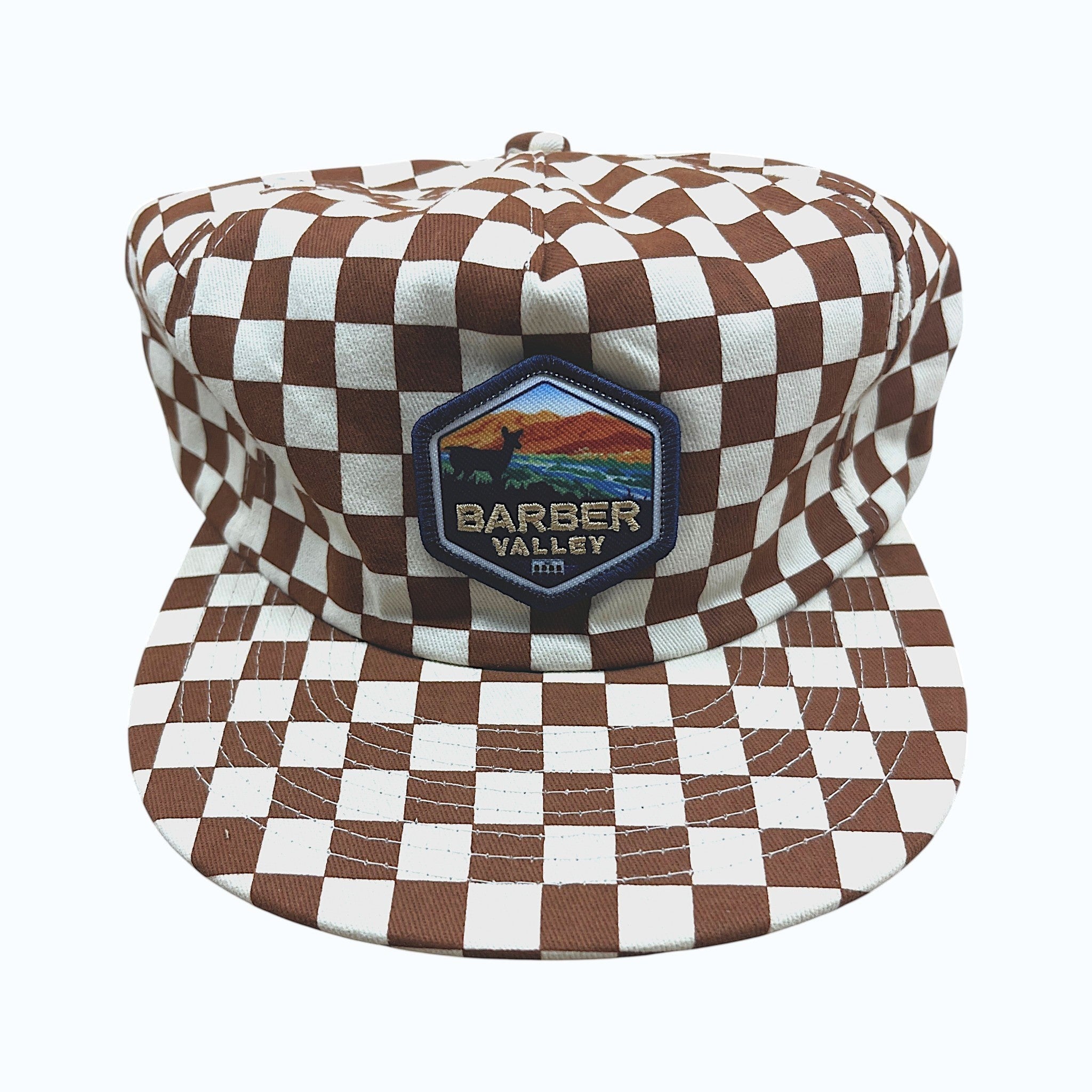 Barber Valley Threads brown and white checkered snapback hat with a custom embroidered landscape patch on the front.