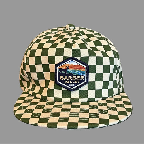 Barber Valley Threads green and white checkered snapback hat with a custom embroidered landscape patch on the front.